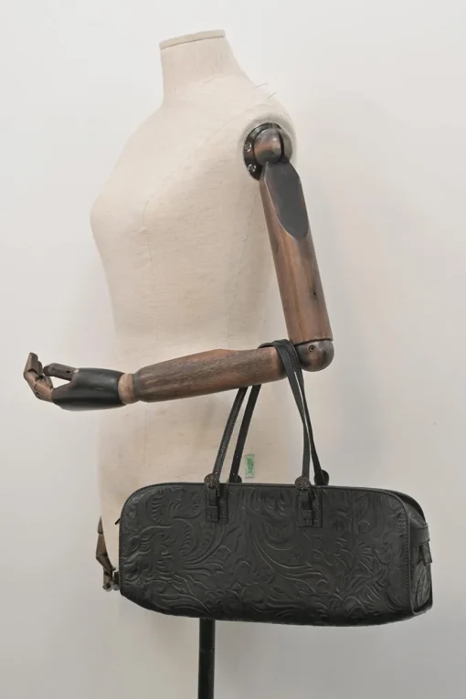 Black floral-embossed leather East West Boston bag