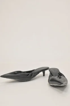 Black gathered supple lambskin pointed-toe Scrunch Knife mules with toggle vamps and comma heels
