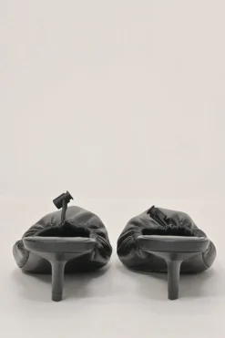 Black gathered supple lambskin pointed-toe Scrunch Knife mules with toggle vamps and comma heels