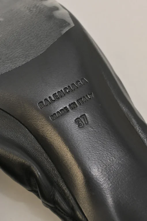 Black gathered supple lambskin pointed-toe Scrunch Knife mules with toggle vamps and comma heels