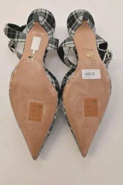 Black Glen check tweed and leather pointed-toe D'Orsay court pumps with crystal-embellished vamp buckle appliqué