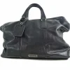 Black grained calf twin handle tote bag with top zip opening.