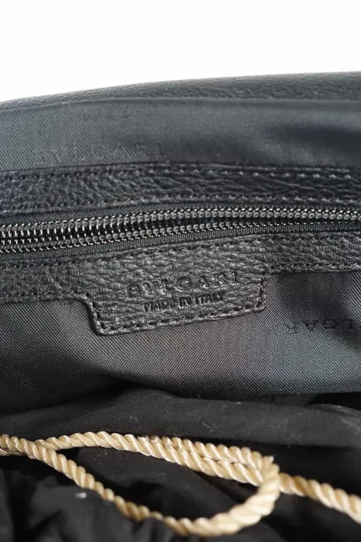 Black grained calf twin handle tote bag with top zip opening.
