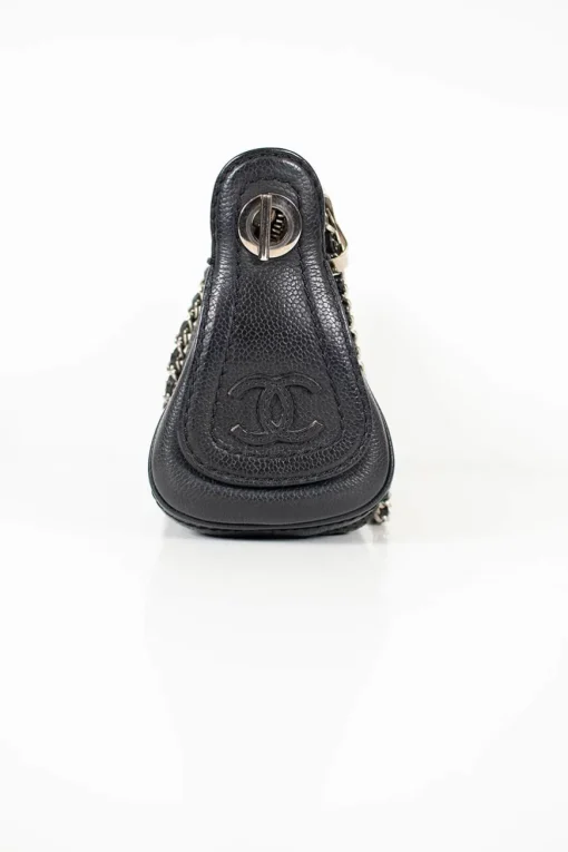 Black grained leather perforated cross-body bag with CC logo on side panels and silver hardware and chain strap