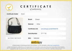 Black grained leather perforated cross-body bag with CC logo on side panels and silver hardware and chain strap