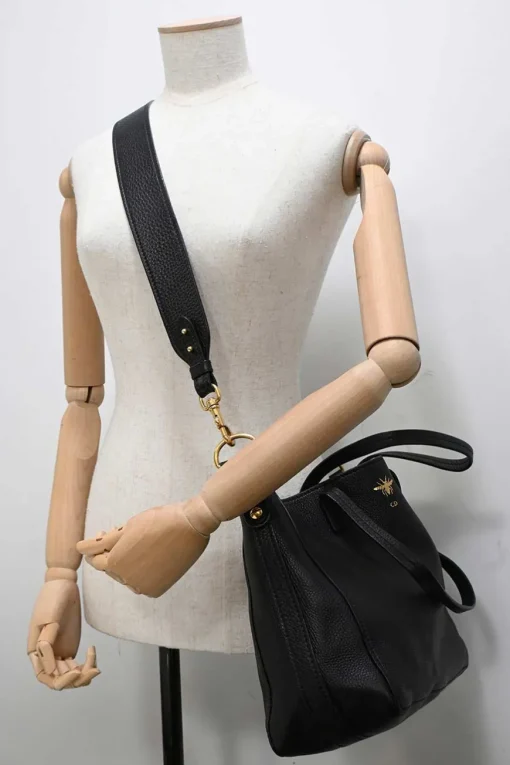 Black grained leather tote bag with gold-tone hardware