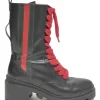 Black leather and rubber Trip pull-on mid-calf platform combat boots with webbing trim detailing and tread soles