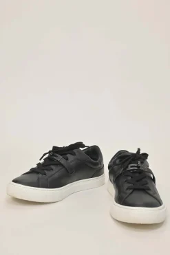 Black leather and rubber low-top Day sneakers with palladium-plated Kelly buckle mid-arch strap