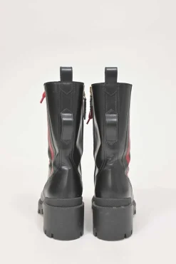 Black leather and rubber Trip pull-on mid-calf platform combat boots with webbing trim detailing and tread soles