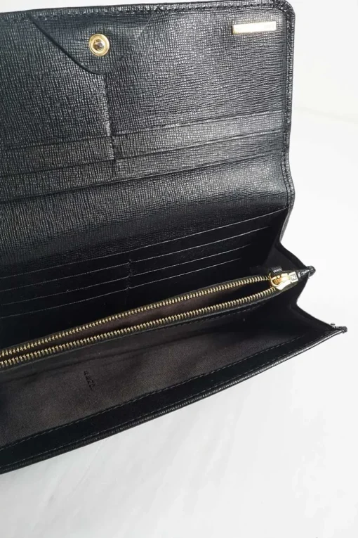 Black leather flap continental wallet