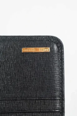 Black leather flap continental wallet