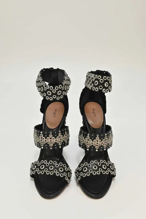 Black leather grommet-embellished scalloped leather zip-up block heel sandals