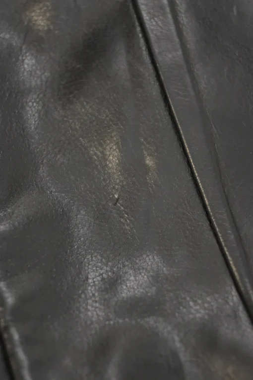 Black leather Hystetria zip pouch featuring gold-tone metallic medallion appliqué