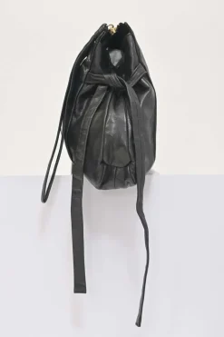 Black leather Hystetria zip pouch featuring gold-tone metallic medallion appliqué