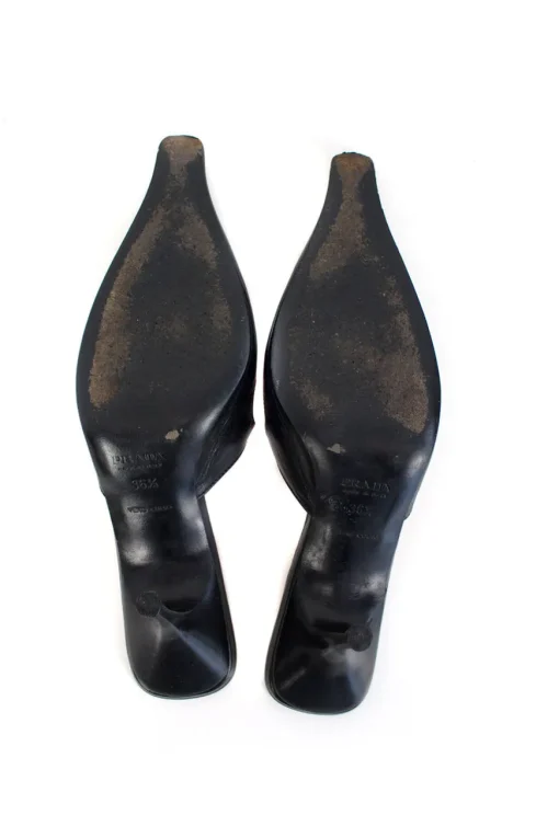 Black leather long-toed mules