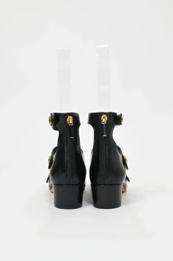 Black leather multi-strap square toe Baby-D low heel pumps with decorative enamelled gold-finish metal buttons