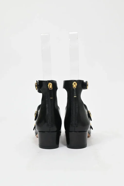 Black leather multi-strap square toe Baby-D low heel pumps with decorative enamelled gold-finish metal buttons