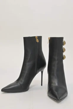 Black leather pointed-toe Roni ankle boots with coat of arms shank buttons