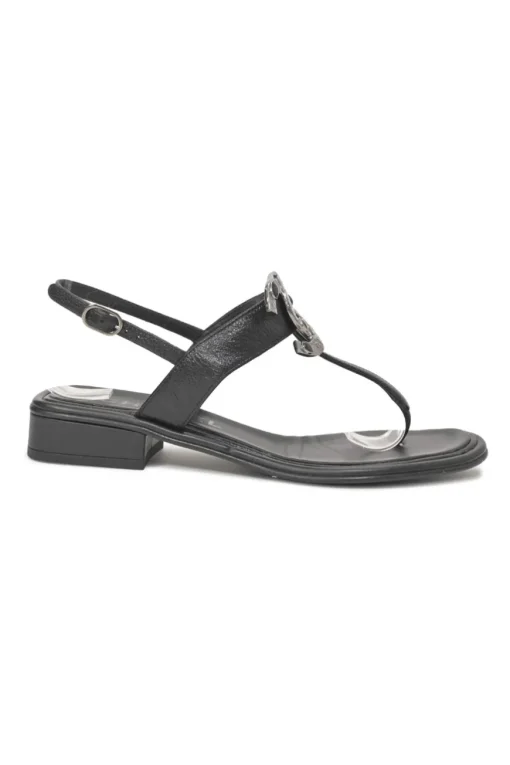 Black leather slingback thong sandals featuring cabochon Coco Mark logo plaque