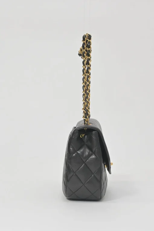 Black matelassé lambskin leather 1994-1996 envelope flap shoulder bag with 24-karat gold-plated hardware
