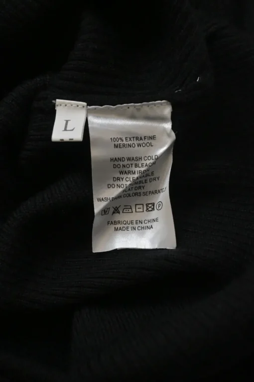 Black merino wool half-button collared polo-style bodysuit