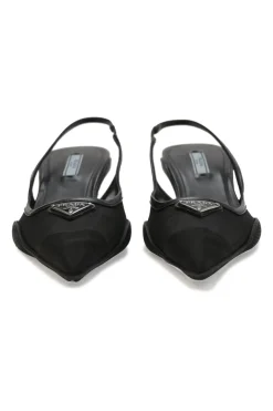 Black mesh, leather and rubber pointed-toe slingback kitten-heel pumps with metallic enamel logo vamp plaque