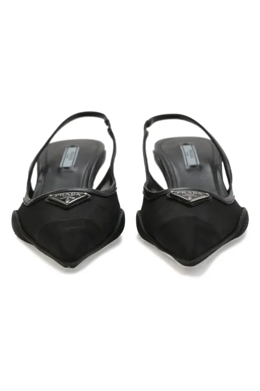 Black mesh, leather and rubber pointed-toe slingback kitten-heel pumps with metallic enamel logo vamp plaque
