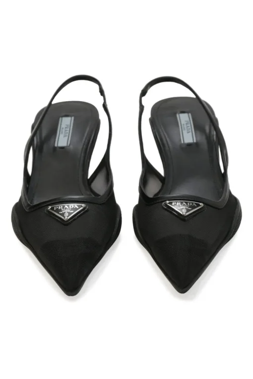 Black mesh, leather and rubber pointed-toe slingback kitten-heel pumps with metallic enamel logo vamp plaque