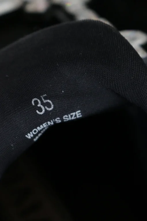 Black neoprene Viv' running chunky sneakers with mid-arch Belle crystal buckle and elastic strap