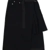 Black paneled cotton denim wrap-front apron-style midi skirt with plissé hip insert