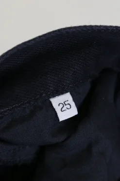 Black paneled cotton denim mid-rise five-pocket flared jeans with contrasting leg inserts