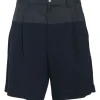 Black paneled cotton-blend pull-on mid-rise pleat-front bermuda shorts
