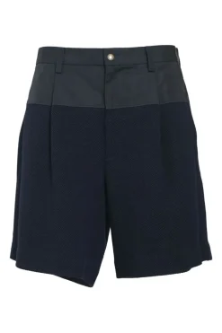 Black paneled cotton-blend pull-on mid-rise pleat-front bermuda shorts
