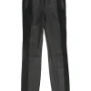 Black paneled leather and suede pull-on high-rise skinny pants with slanted hip welt pockets