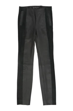 Black paneled leather and suede pull-on high-rise skinny pants with slanted hip welt pockets
