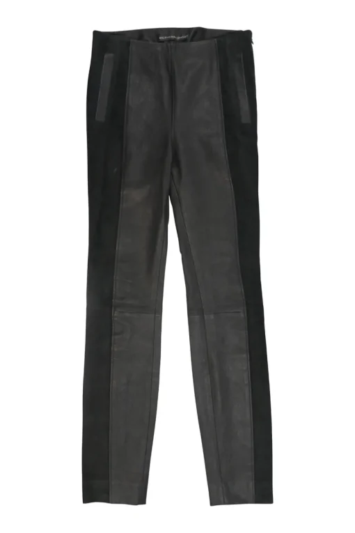 Black paneled leather and suede pull-on high-rise skinny pants with slanted hip welt pockets