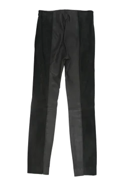 Black paneled leather and suede pull-on high-rise skinny pants with slanted hip welt pockets