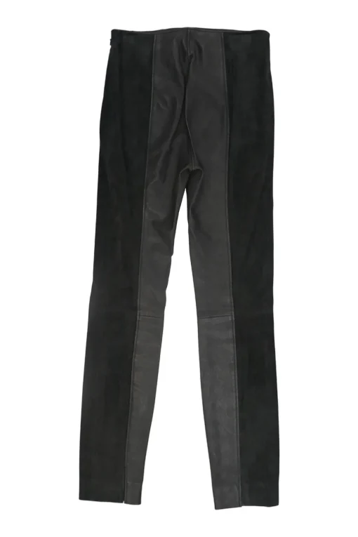 Black paneled leather and suede pull-on high-rise skinny pants with slanted hip welt pockets