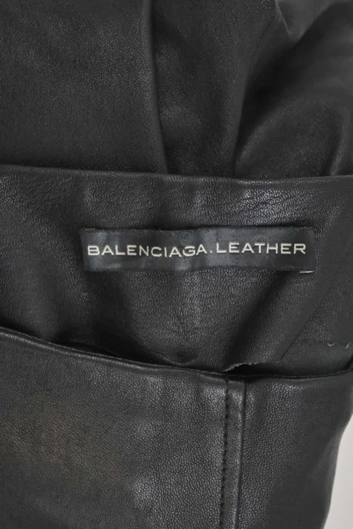 Black paneled leather and suede pull-on high-rise skinny pants with slanted hip welt pockets