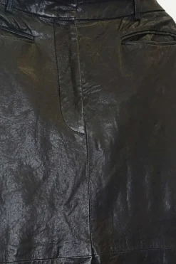 Black paneled leather high-rise midi godet skirt with double-welt hip pockets