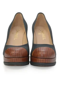 Black paneled leather round-toe block heel stacked platform pumps with contrasting cap toe
