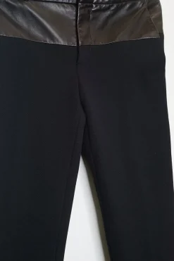 Black paneled polyamide and leather mid-rise skinny tailored trousers