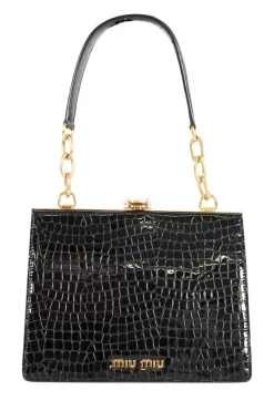 Black patent croc print  in a gold clasp frame bag, with round crystal embellishment and crystal clasp.
