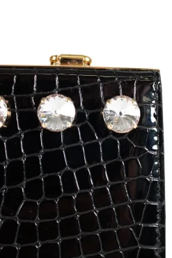 Black patent croc print  in a gold clasp frame bag, with round crystal embellishment and crystal clasp.