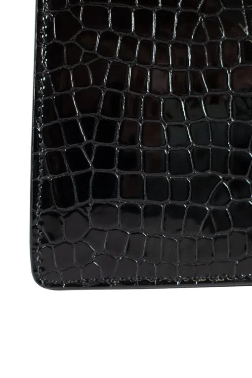 Black patent croc print  in a gold clasp frame bag, with round crystal embellishment and crystal clasp.