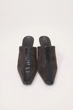 Black patent leather and suede heeled mules with chiseled square toes