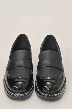 Black patent leather and calfskin round-toe penny-style pinked edge loafers with chainlink vamp appliqué