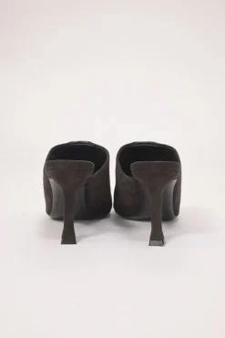 Black patent leather and suede heeled mules with chiseled square toes