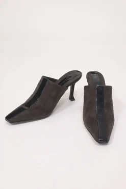 Black patent leather and suede heeled mules with chiseled square toes