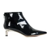 Black patent leather ankle boots with low silver heels.